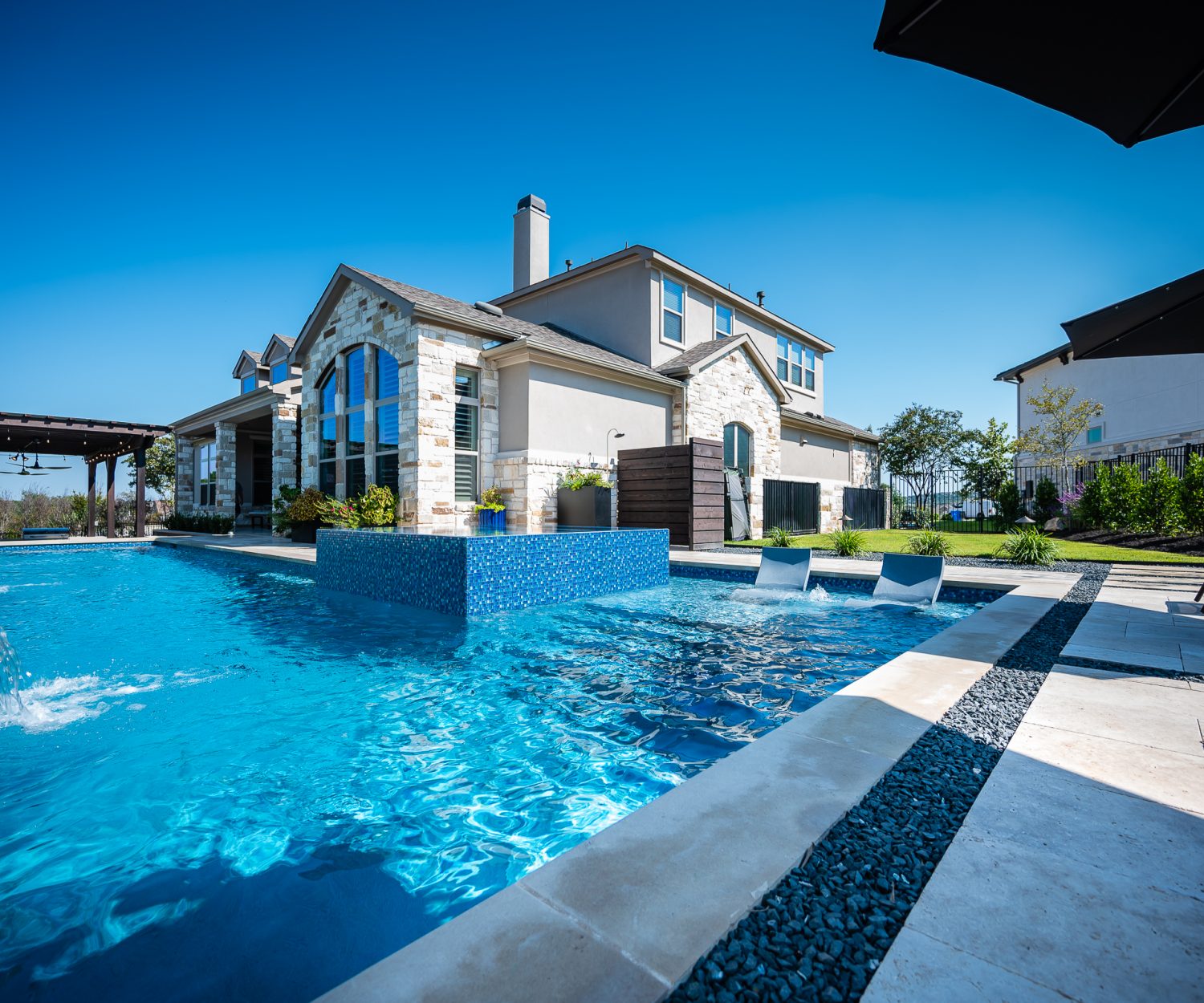 Transform your Holmdel backyard with custom inground pools by Cummins Signature Pools. Expert design, quality craftsmanship, and personalized service.